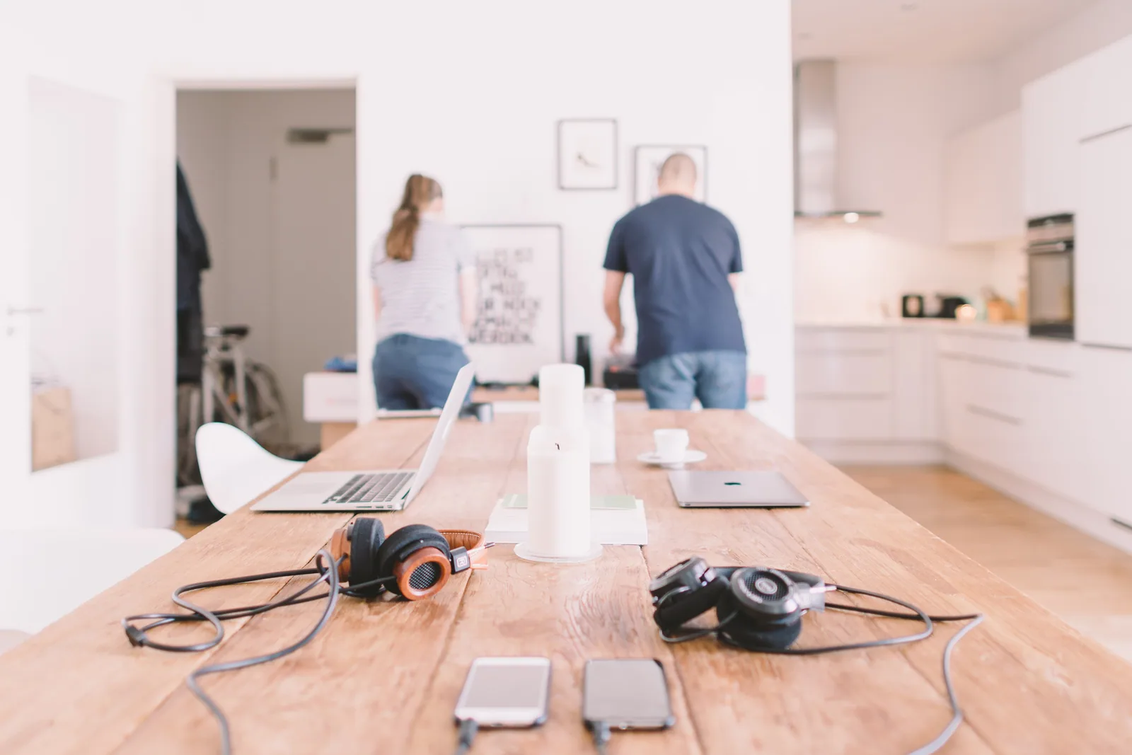 Two colleagues working together in a bright open-plan office
